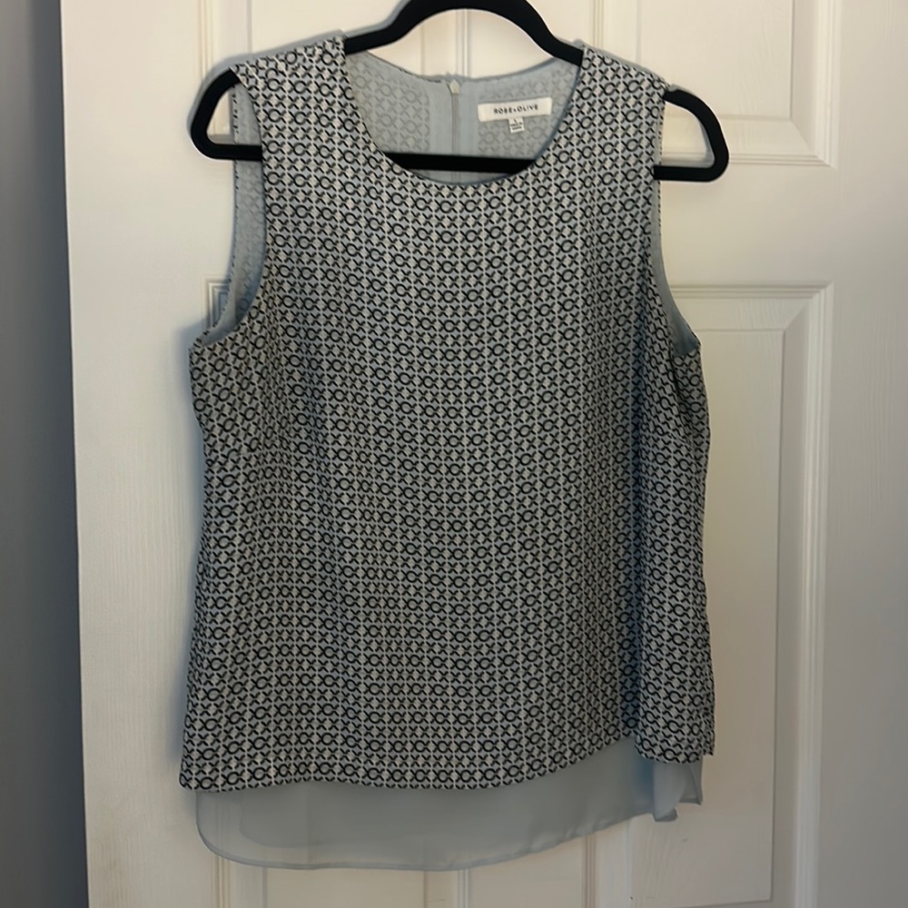 New light blue black & white sleeveless blouse-smoke free home